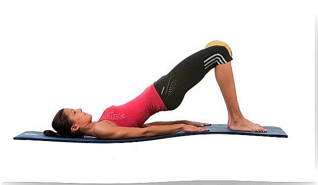 Raising the hips to reduce your waistline.