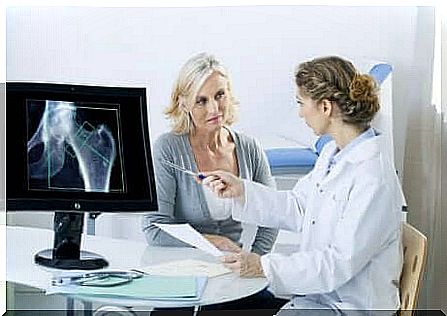 A postmenopausal woman undergoing an X-ray consultation. 